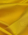 Deadstock  Meterware Jacquardstoff Baumwolle/Polyester Highvisibility Gelb Logo, DG* (Stoffbreite 140 cm) (M6X3X4)