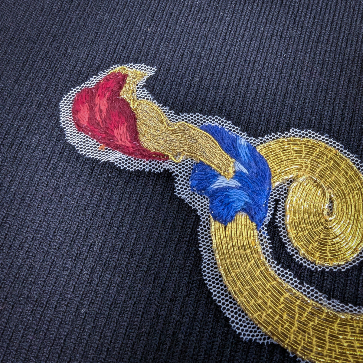 D&G gold embroidered patch with red and blue accents on fine tulle, 30x15 cm.