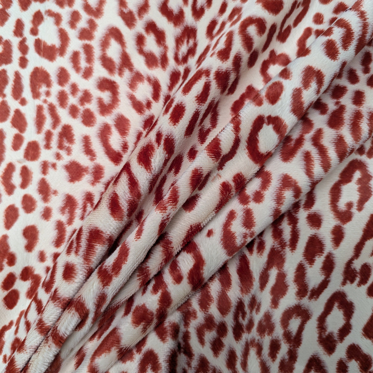 Mantelstoff · Baumwolle/Polyester · Leopardenmuster · Farbe: Naturweiß- und Orangetöne · 130 cm · 280 g/m² · Meterware