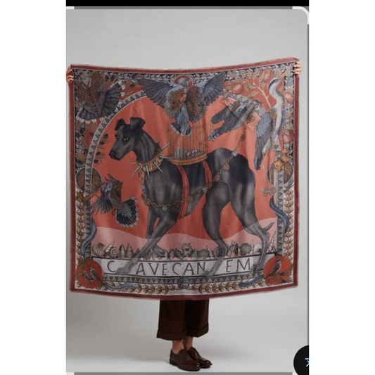 Sabina Savage silk scarf, 140x140cm, featuring a large black dog with chains and birds on a terracotta background.