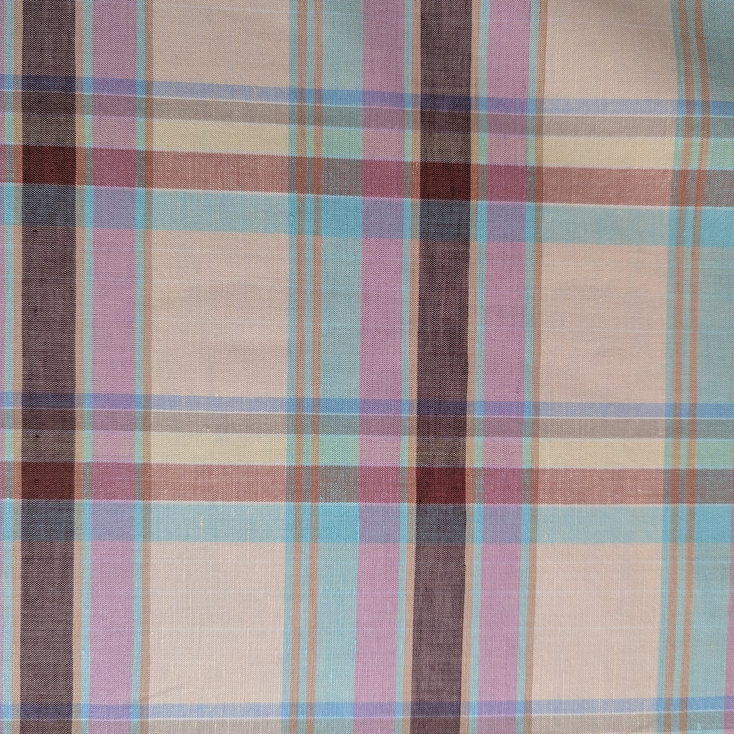 Gucci deadstock cotton-linen tartan fabric, 155cm wide, with pastel pink, blue, brown, and beige plaid.