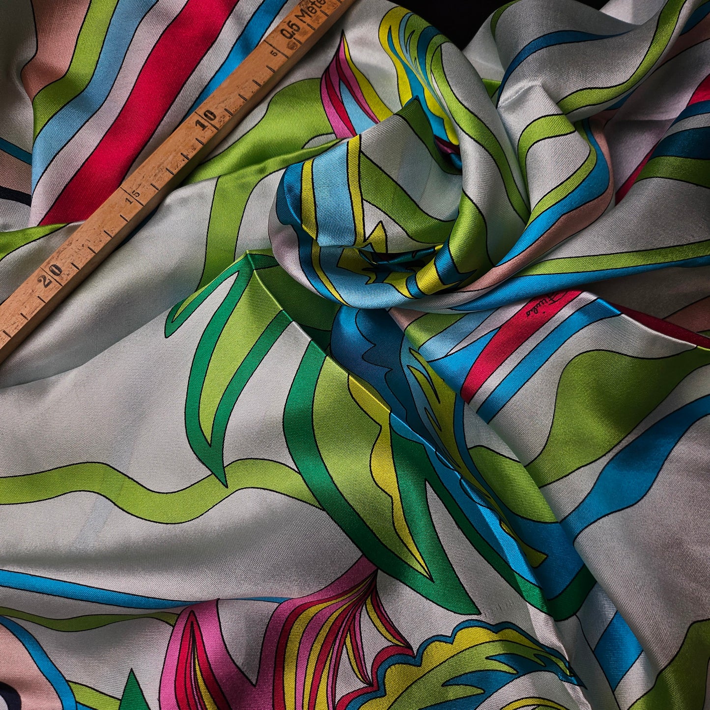 Pucci Twill Silk Scarf, 90x90cm, with vibrant white, pink, green, blue, and yellow abstract patterns.