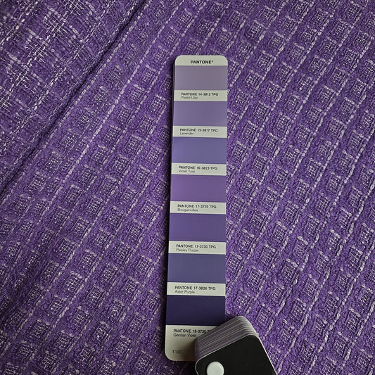 G###i Deadstock Tweed Bouclé fabric in Pantone Bougainvillea, a light purple melange.