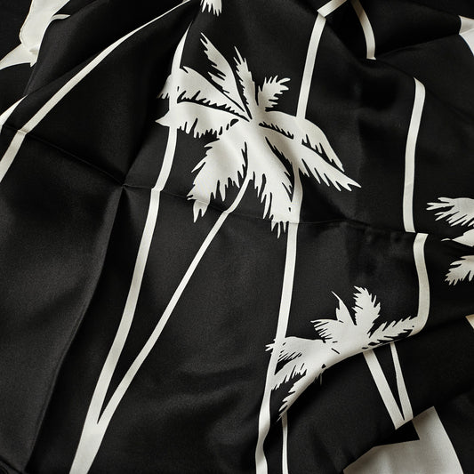 Black silk scarf with white palm tree and stripe design, 90x90 cm.