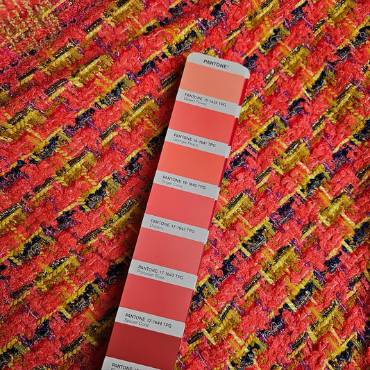 Deadstock G*cci tweed fabric in vibrant coral, yellow, and navy, with a Pantone color swatch.