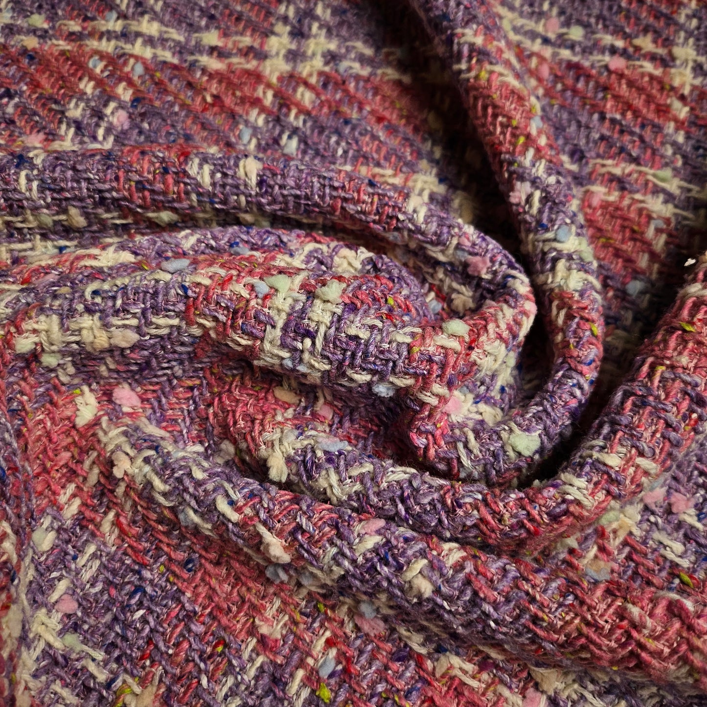 Deadstock G###i tweed fabric in Chateau Rose and Bougainvillea Blush Powder, 140 cm wide.