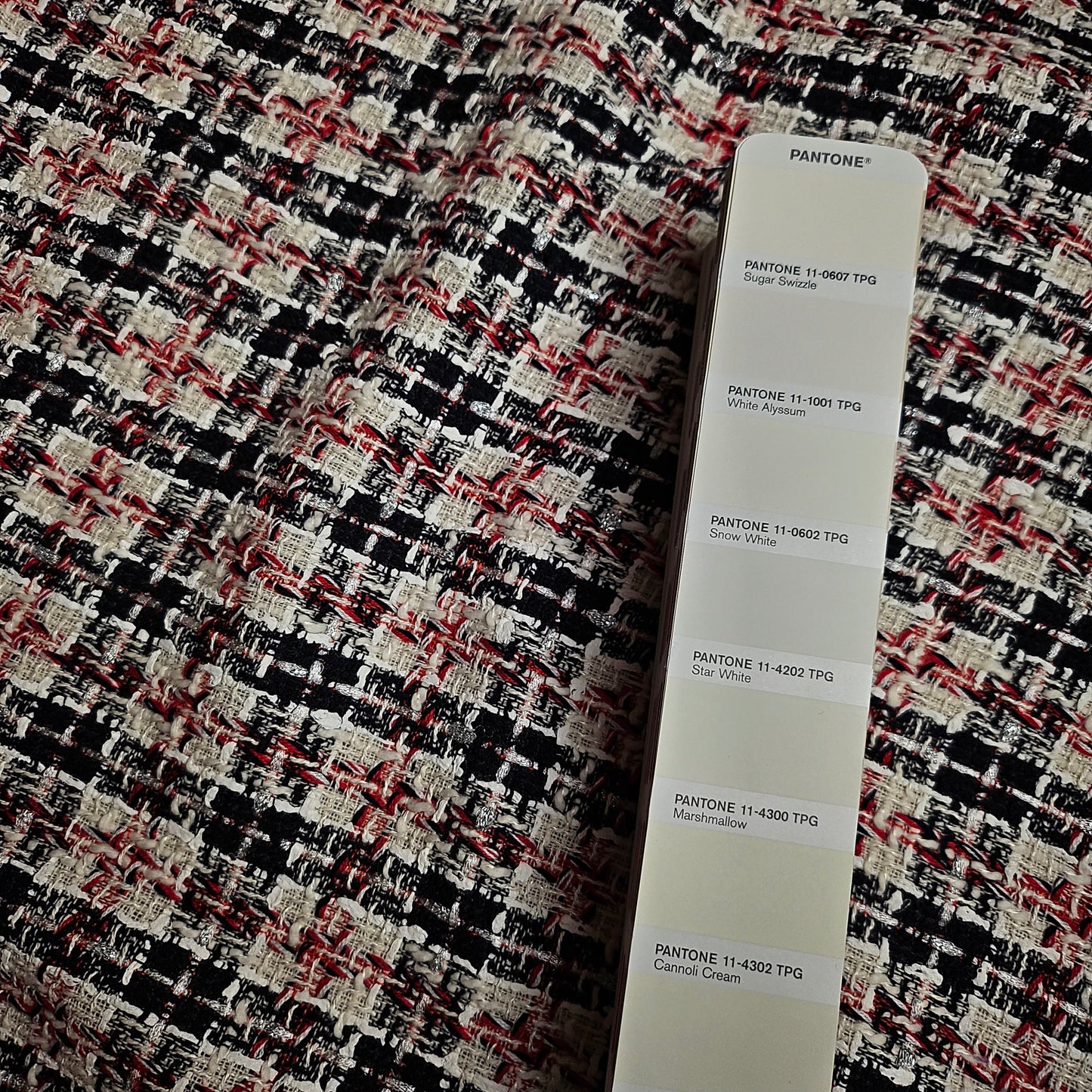 Deadstock G*cci tweed fabric, 145cm wide, in Star White, black, and red, with a Pantone color guide.