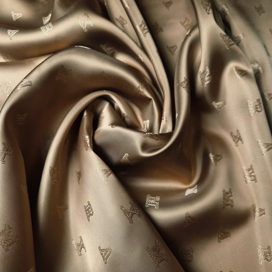 Futter · Viskose · Logo · Pantone Tan · 140 cm · 90 g/m² · Einzelstück