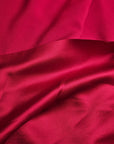 Designerstoff – Deadstock Viskose-Polyester Satin Basisfarbe Pantone Racing Red | 140 cm | M6X4X21