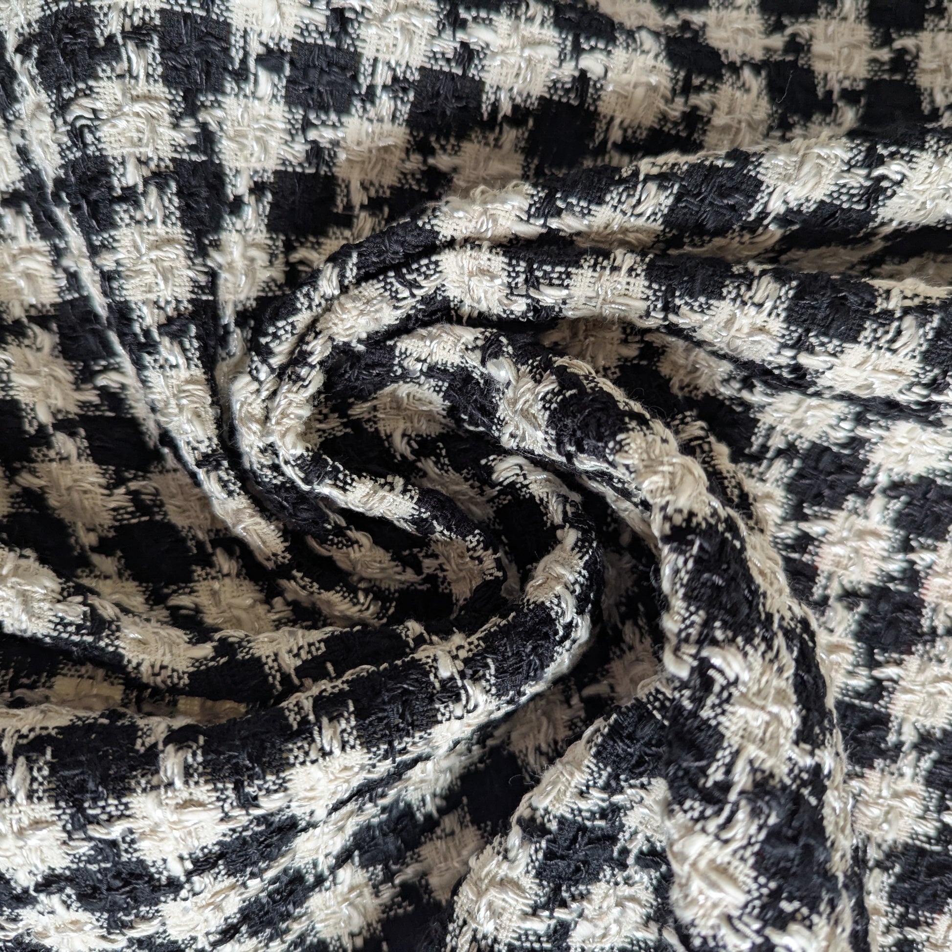 Black and white houndstooth tweed fabric, deadstock designer material, 145 cm wide.
