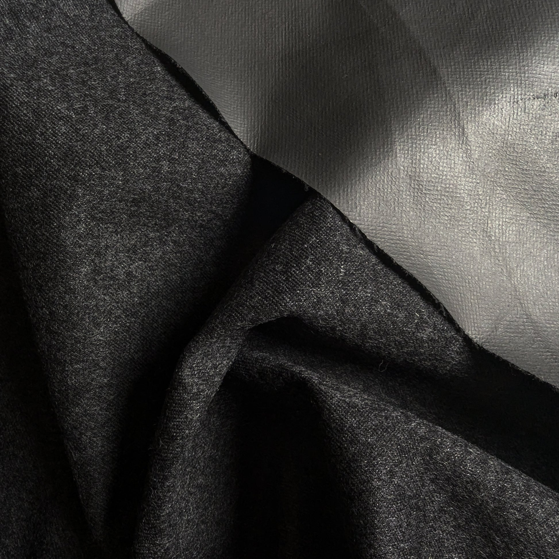 Anthracite Loro Piana Cashmere Storm System deadstock fabric, draped with a subtle texture.