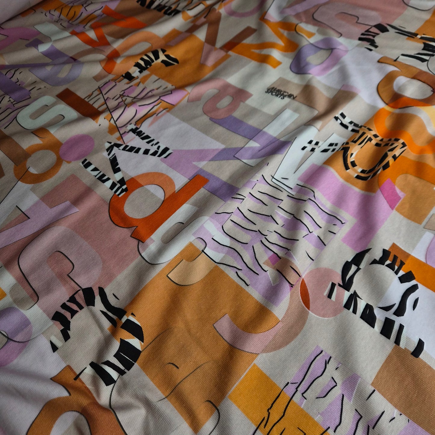 Feinripp · Baumwolle, Elasthan · Logo · Gelbtöne · 135 cm · 190 g/m² · Meterware