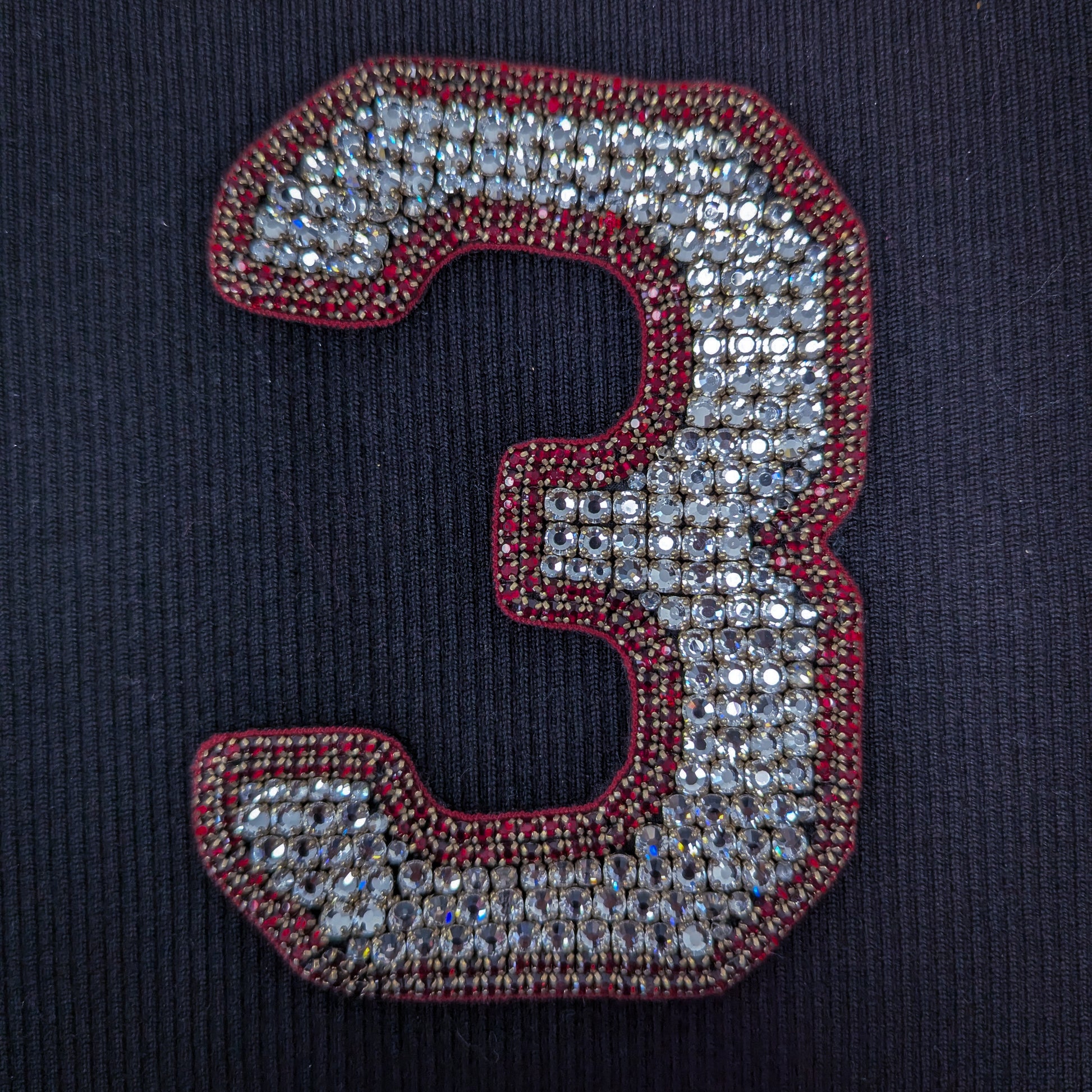 Embroidered D&G number 3 patch, 13cm, adorned with sparkling rhinestones and red beaded trim.