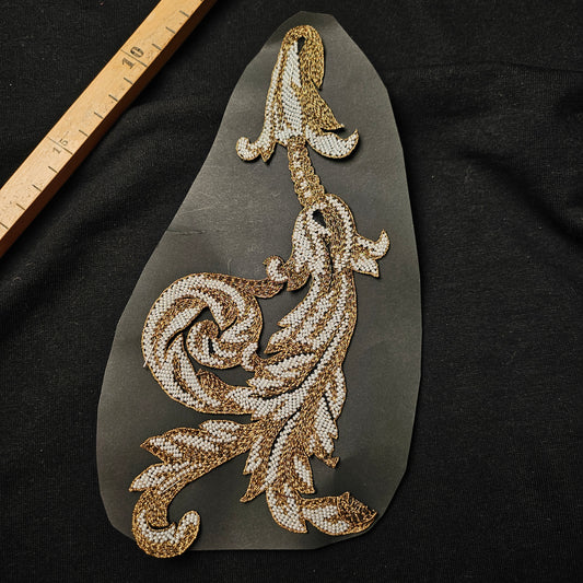 D&G 11x23cm metal and pearl embroidered patch with an elegant gold and white ornamental design.
