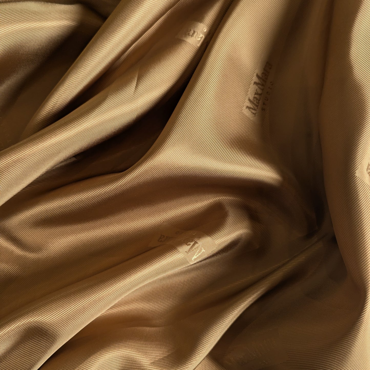 Camel Max Mara Studio deadstock viscose lining fabric, smooth and draped.