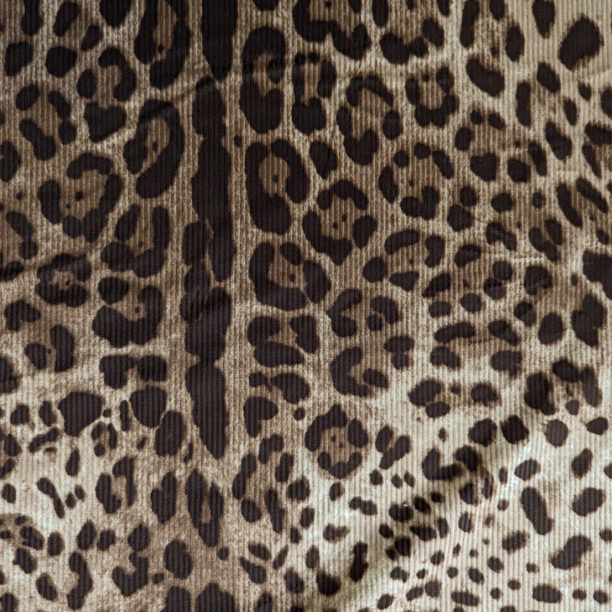 D&G deadstock corduroy fabric with a brown leopard print, 150 cm wide.