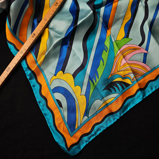 Multicolor P*cci deadstock twill silk scarf, 90x90 cm, with vibrant abstract patterns and a ruler.