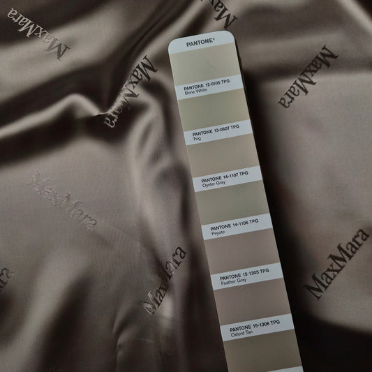 Einzelstück · Futterstoff · B-Ware · Viskose · Logo · Pantone Feather Gray · 300×145 cm