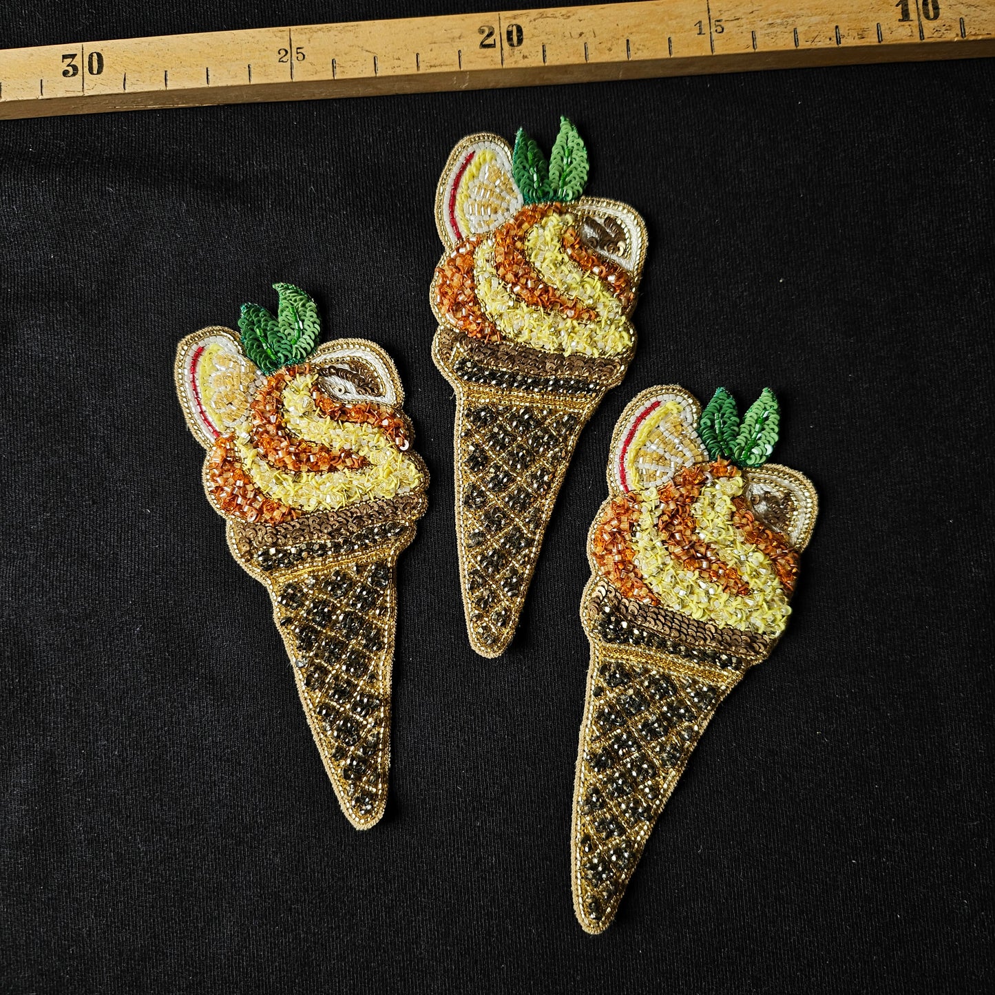 Three beaded ice cream cone patches with yellow, orange, and brown pearls, 5x12cm.