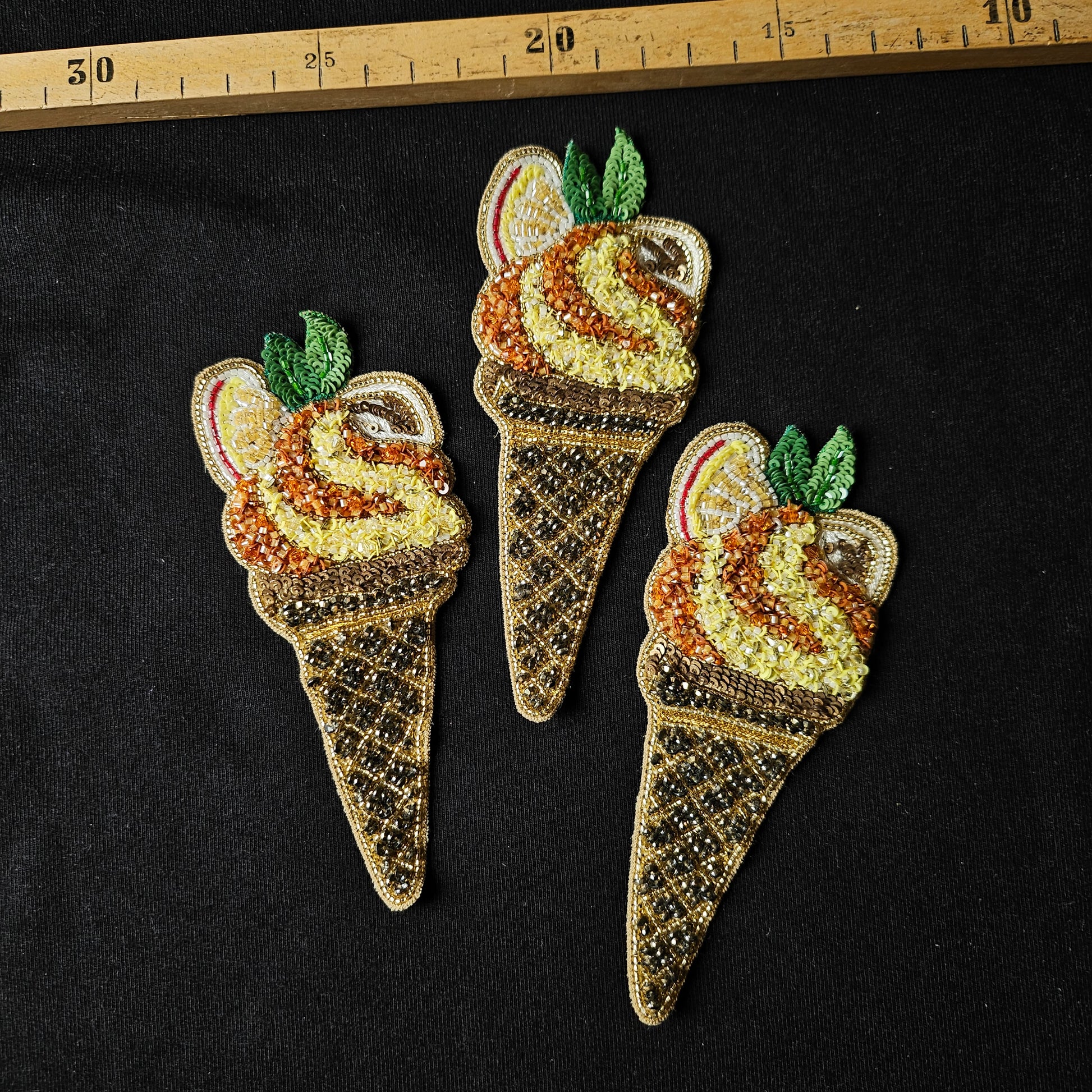 Three beaded ice cream cone patches with yellow, orange, and brown pearls, 5x12cm.