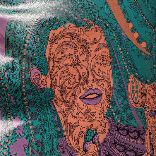 Deadstock polyester fabric with an ornate multicolor face design in purple, pink, and green tones.