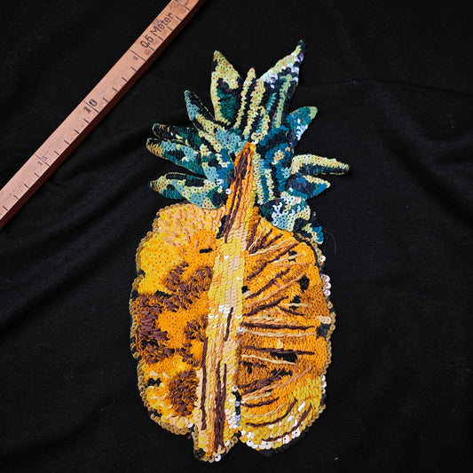 D&G sequin pineapple patch, 15x30cm, with yellow, gold, green, and blue paillettes on black fabric.