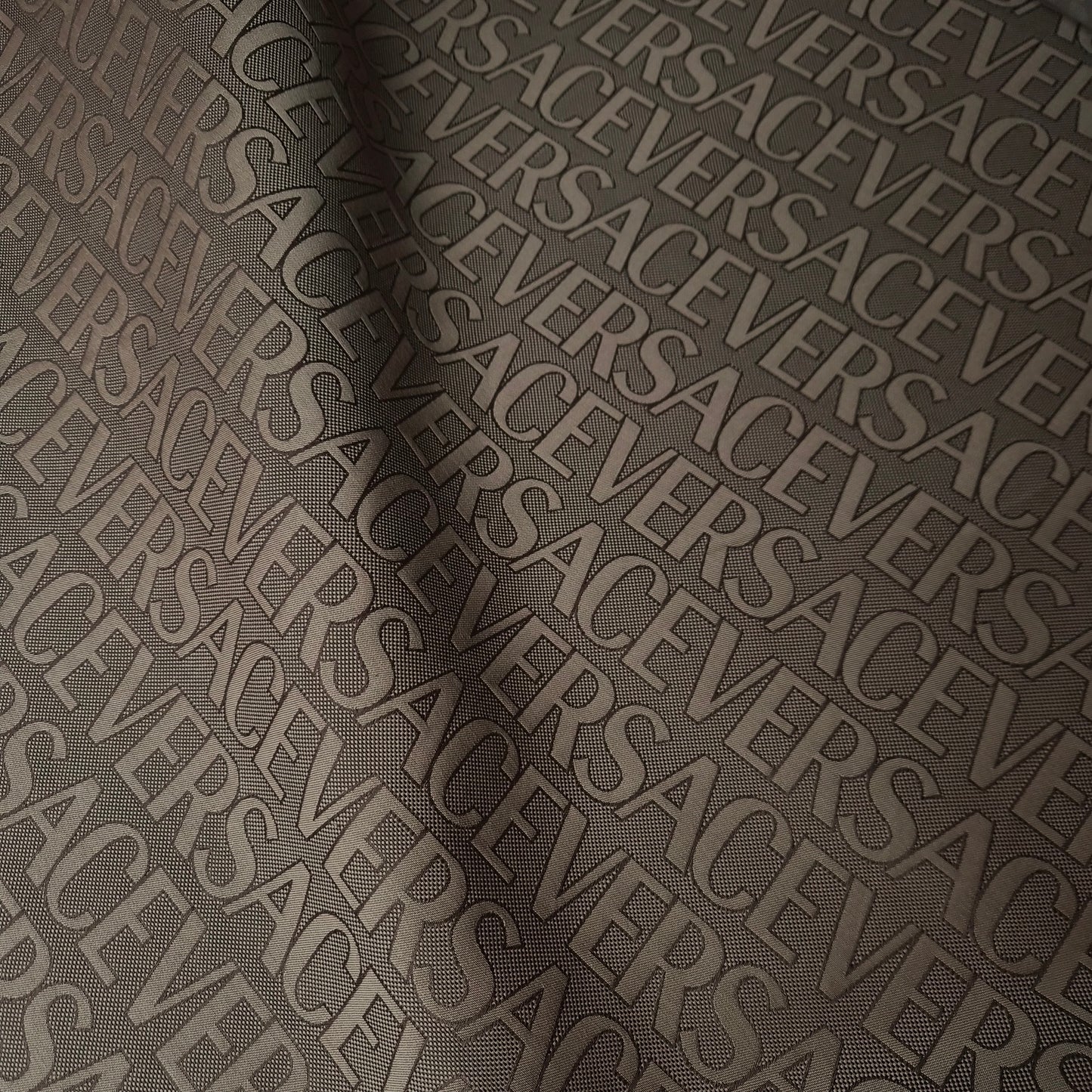 Jacquard · Polyester · Logo · Braun- und Beigetöne · 155 cm · 300 g/m² · Meterware
