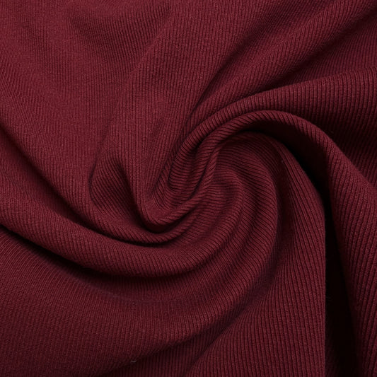 Deadstock elastic rib knit fabric in a rich wine red, showing its ribbed texture and soft drape.